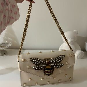 Authentic Gucci Elegant White Designer Bag with Bee Embellishment